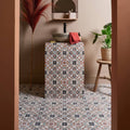 Pavilion Porcelain Russet Red geometric porcelain mosaic on a vanity in muted earth tones