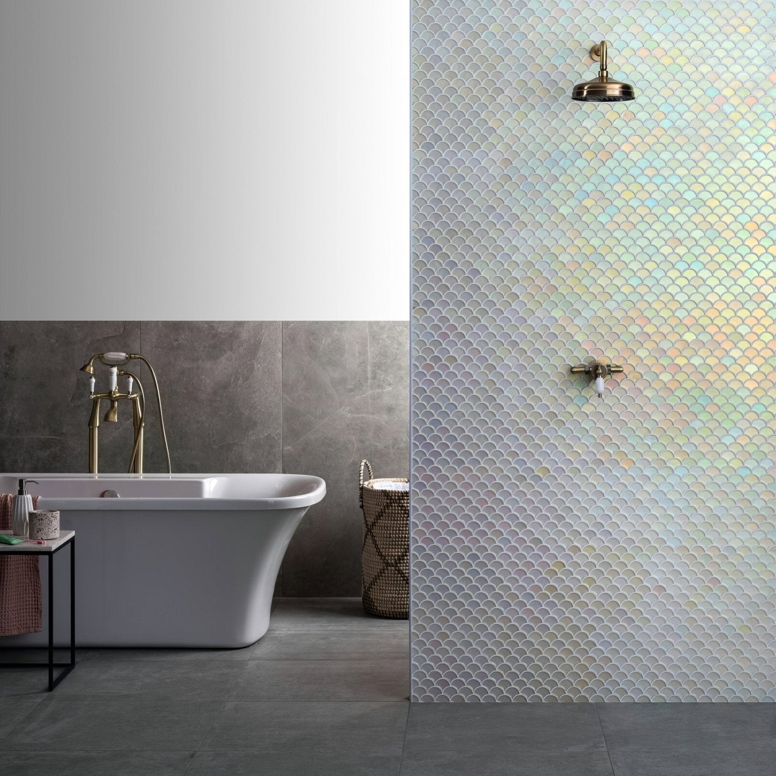 Pearl scale frosted iridescent fish scale mosaic tiles with blue and gold hues on shower wall creating shimmering effect