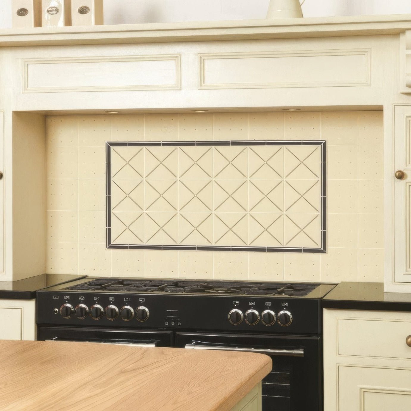 Pearl trellis charcoal grey cream ceramic tile with black border and diamond pattern on county white background