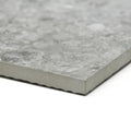 Grey speckled ceramic tile pebble beach grey 60 x 30cm with a textured stone like surface for flooring and walls