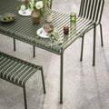 Olive green metal slat dining table with matching bench and chair pebble beach taupe 120 x 60cm set