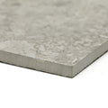 Pebble Beach Taupe gray stone tile with subtle mottled texture and slightly rough edges 120 by 60 centimeters