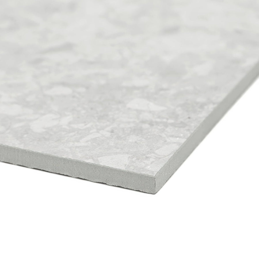Gray terrazzo tile pebble beach white 120 x 60cm with speckled mottled surface and beveled edges