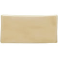 Cream-colored rectangular ceramic pebble half tile with smooth glossy finish ideal for wall and backsplash use