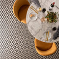 Penshaw black on chalk marble tabletop with gold cutlery and a bottle of wine for elegant dining settings