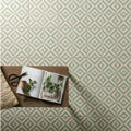 Penshaw teal on chalk geometric patterned floor tiles in muted sage green and off-white for stylish interiors