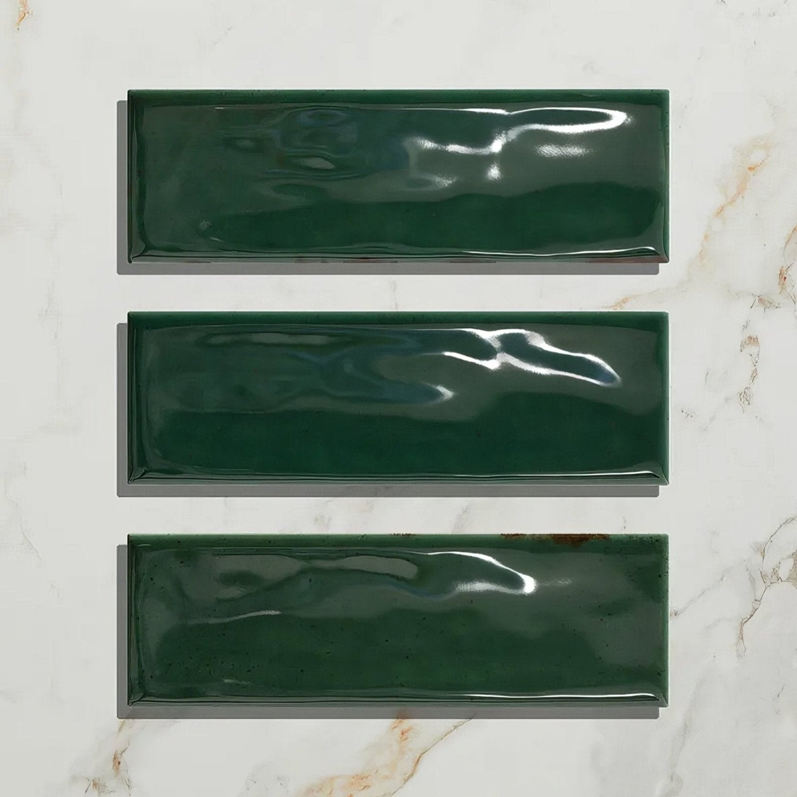 Three glossy dark green rectangular porcelain tiles arranged vertically for petite porcelain gloss green collection