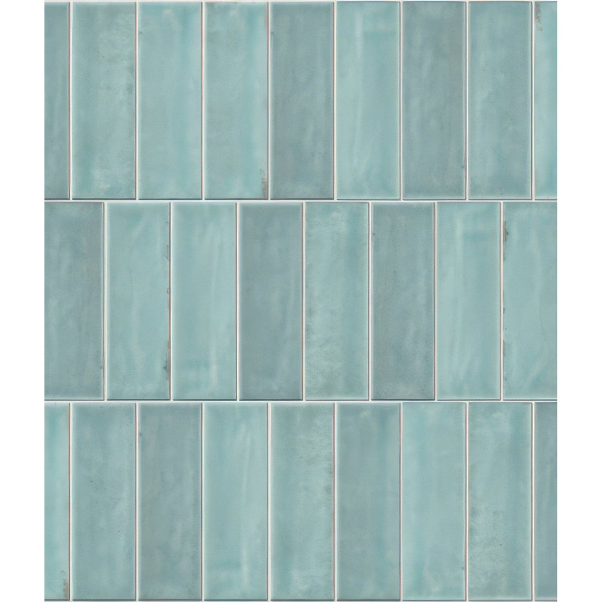 Teal rectangular glass mosaic tiles with a subtle matte finish from petite porcelain gloss sky collection