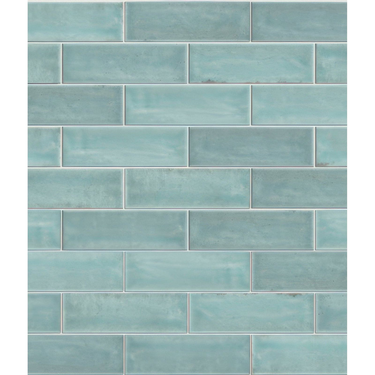Teal rectangular porcelain subway tiles with a subtle matte finish from petite porcelain gloss sky collection