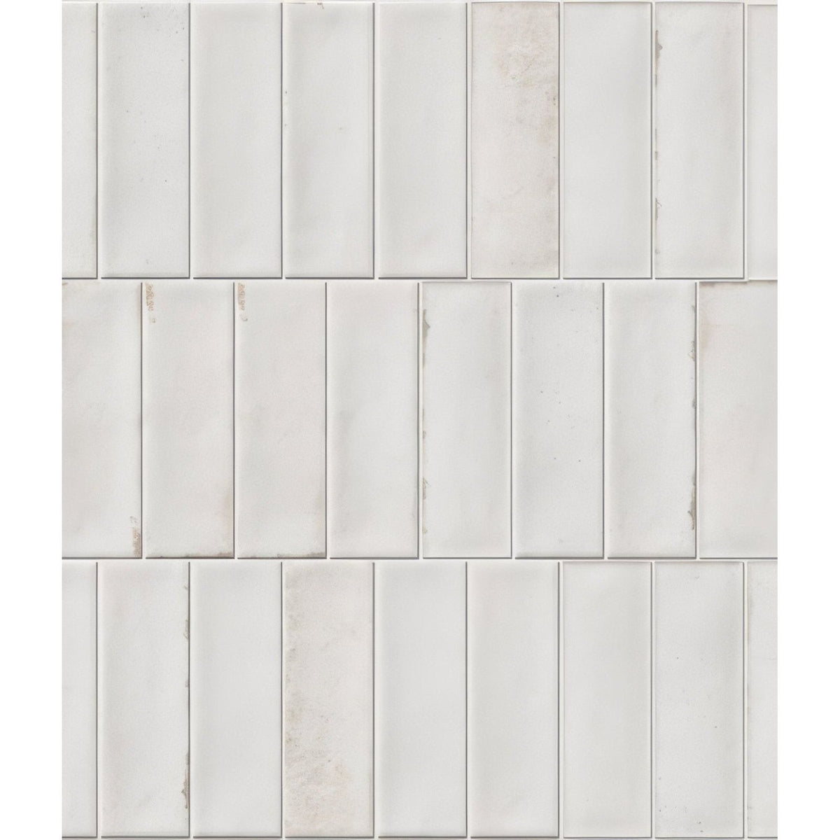 White rectangular marble porcelain tiles arranged vertically featuring petite porcelain gloss white finish