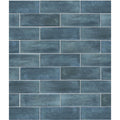 Petite porcelain matt blue rectangular ceramic tiles in blue-gray with a rustic textured finish arranged in brick pattern