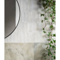White rectangular porcelain subway tiles with a matte finish arranged in vertical rows petite porcelain matt cotto light