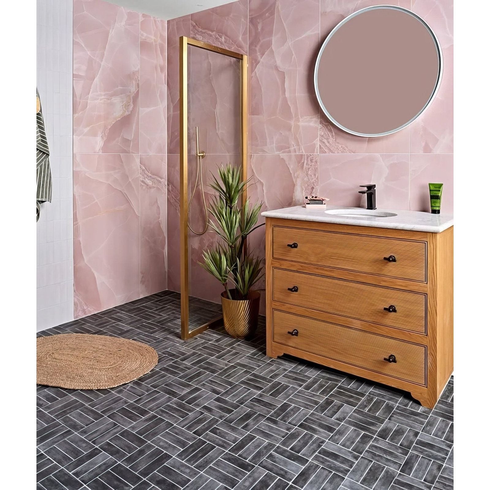 Light wood grain vanity with three drawers and black metal handles in petite porcelain matt graphite finish