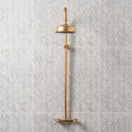Palazzo Pettina 60x30cm grey and white patterned tiles with a brass showerhead