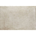 Beige textured pierre porcelain tile with rustic uneven edges and subtle gray veining for stylish flooring