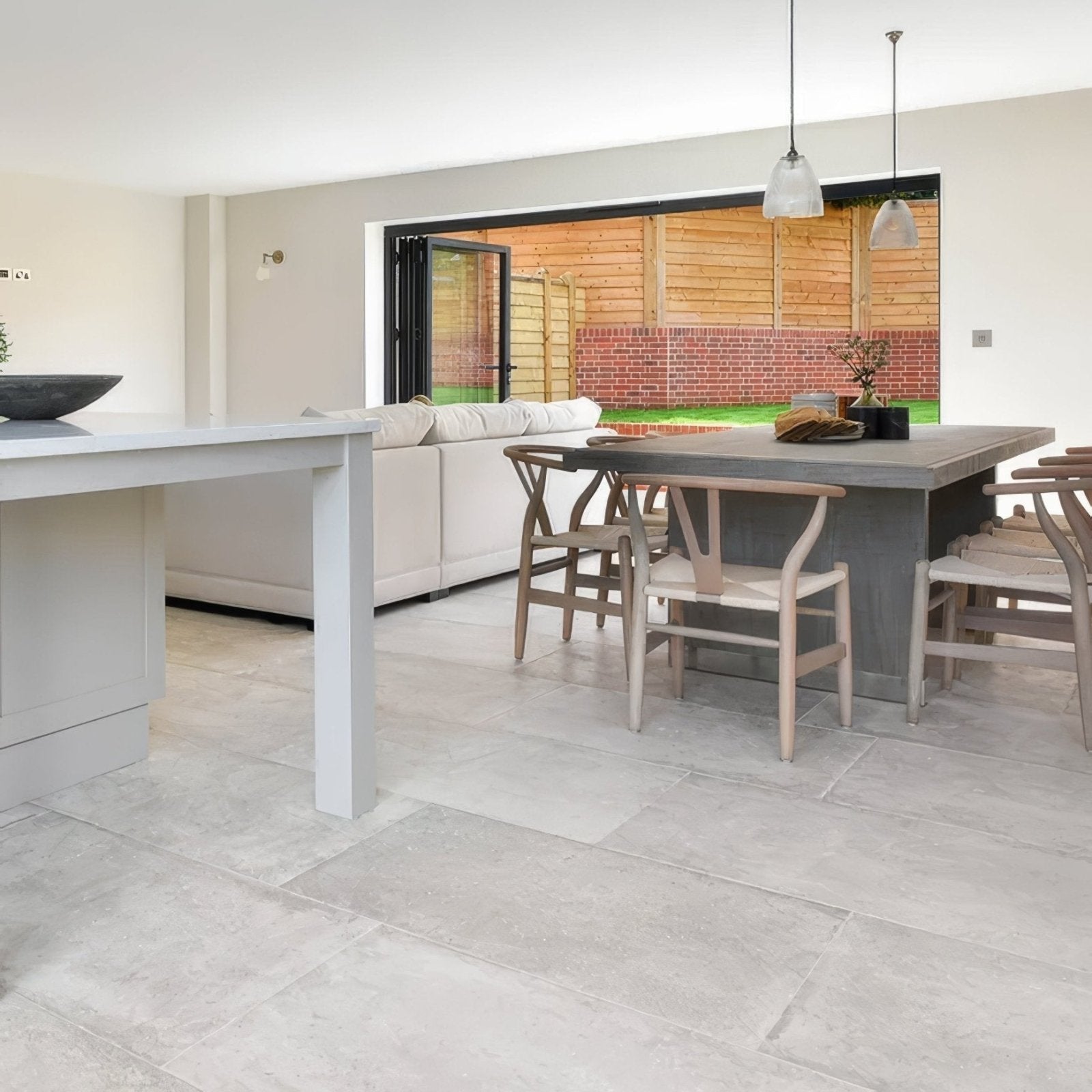 Gray concrete dining table with integrated base and minimalist design in pierre porcelain beige finish