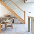 Light wood wishbone chair with woven seat and backrest in porcelain beige for stylish seating