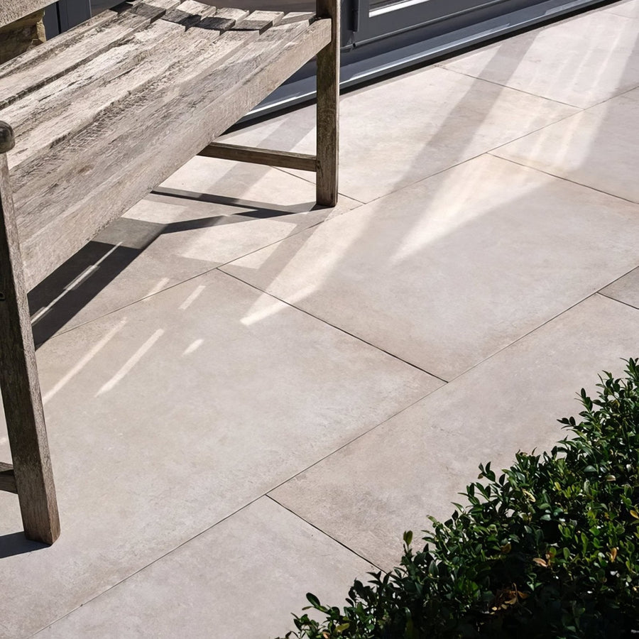 Beige pierre porcelain paving gris stone patio tiles with a smooth slightly textured surface