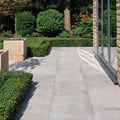 Light gray pierre porcelain paving gris patio tiles with smooth slightly textured stone surface