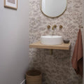 White ribbed ceramic vessel sink with eastern mist pine single tile design for bathroom use