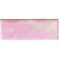 A rectangular pink frost brick radiance ceramic tile with a glossy finish and subtle gradient glow