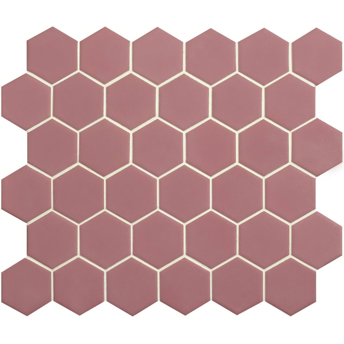 Pink hexagon slip resistant terracotta-colored mosaic tile with cream grout lines for safe flooring use