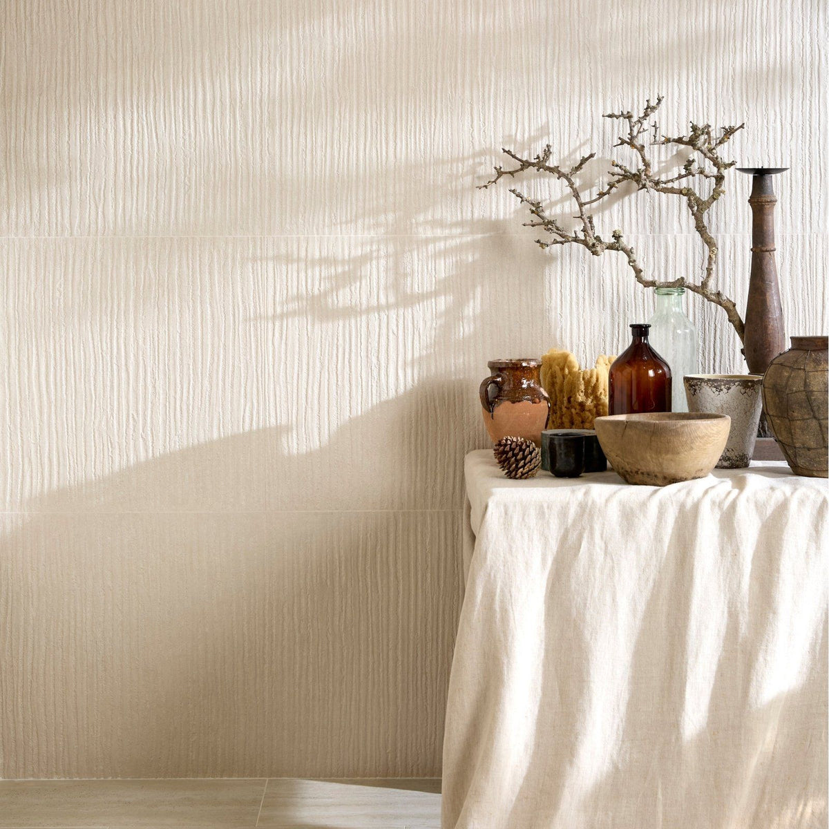 Plastercraft linea mano porcelain ecru textured cream-colored wall tiles with vertical ridges for decorative use