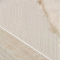 Beige textured porcelain wall tile with vertical ridges and subtle marbling called plastercraft linea mano porcelain ecru textured