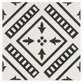 Pompeii black on dover white tile with black and white geometric pattern featuring central diamond and arrow motifs