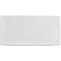 White rectangular mattress pad with a soft textured surface for brick tile porcelain flooring protection