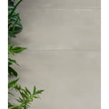 Beige ceramic béton chic porcelain paving tiles with a smooth glossy finish ideal for flooring and outdoor use