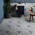 The canero ceramic matt bathroom floor features intricate vintage-inspired geometric patterned ceramic tiles