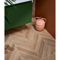 Teracotta-colored davos chevron porcelain matt ceramic vase with two handles and rounded body