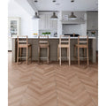 Light brown herringbone patterned davos chevron porcelain matt floor tiles with a textured matt finish