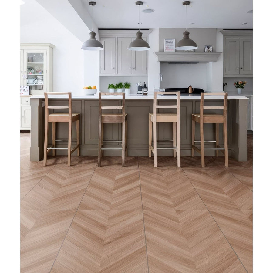 Light brown herringbone patterned davos chevron porcelain matt floor tiles with a textured matt finish