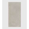 A rectangular matte-finished gray porcelain tile with subtle texture dorset porcelain grey 30 x 60cm