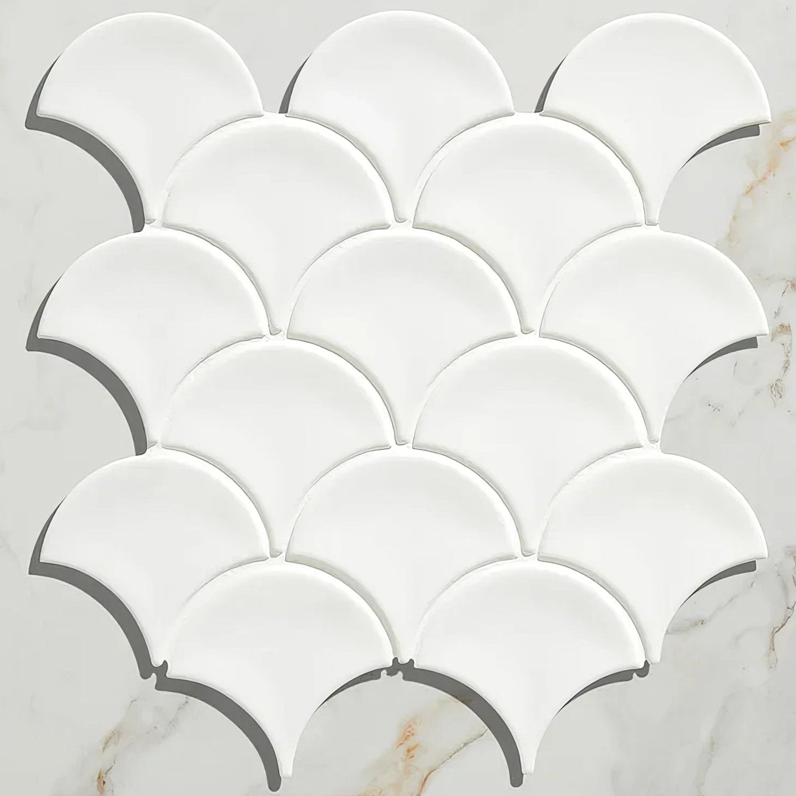 Gelato porcelain mosaic milk white features white glossy fish scale tiles arranged in a repeating pattern