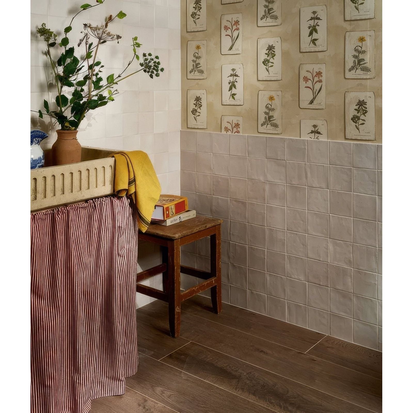 Hammam Ceramic Bone tiles in a styled interior with a wooden stool