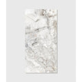 A rectangular white marble illusion Shangri La porcelain polished tile with subtle gray veining and reflective surface
