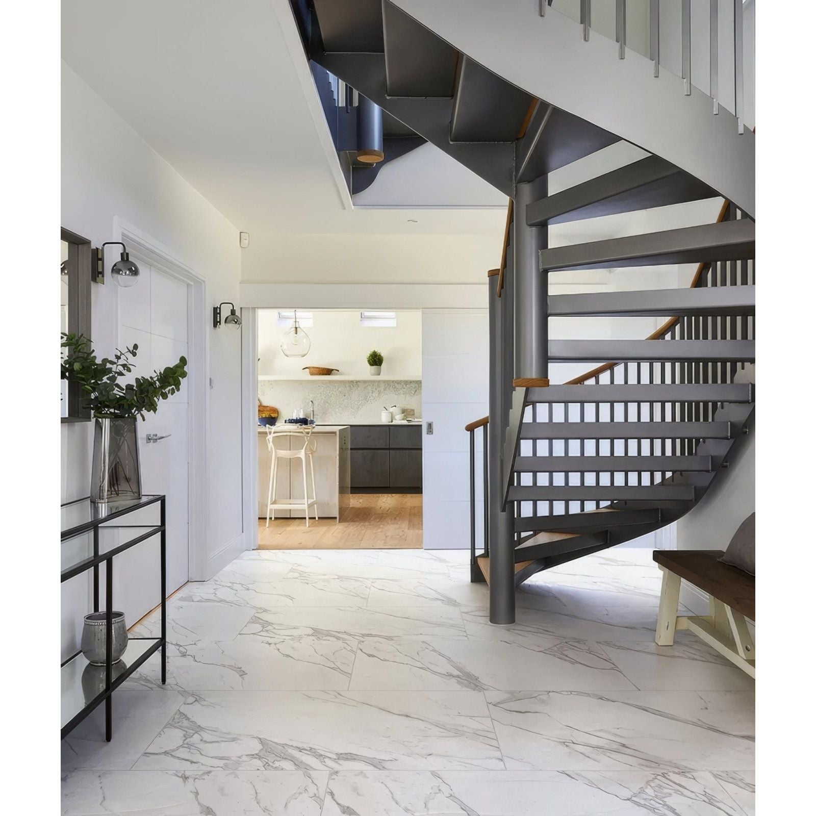 Kensington Porcelain Gloss white marble-effect tiles with a grey spiral staircase