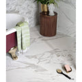 A sleek white marble effect porcelain matt tile with subtle gray veining in 120 x 60cm for bathroom use