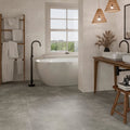 Modern freestanding bathtub with sleek minimalist design and smooth white ceramic finish in loft porcelain grey 60 x 60cm
