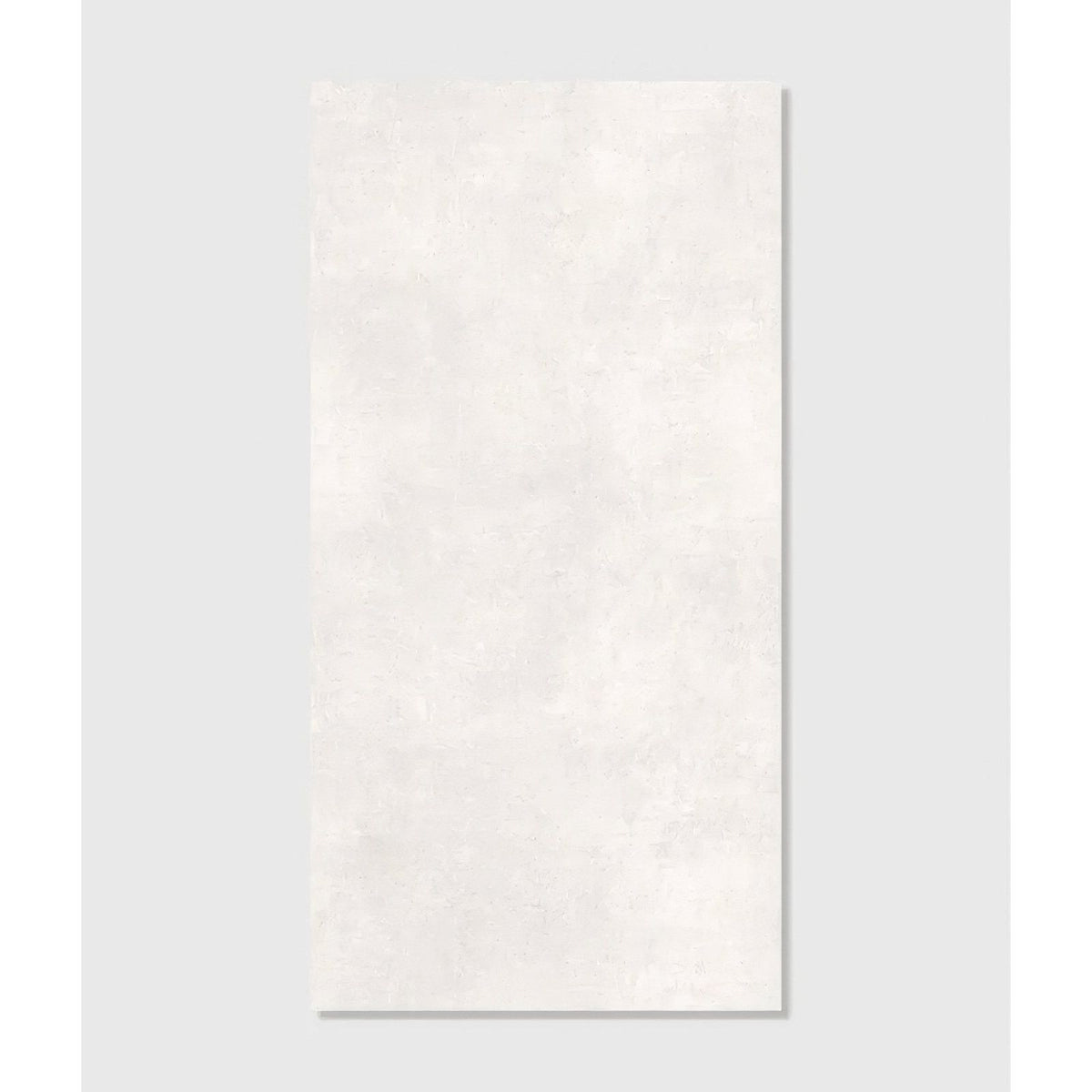 A rectangular off-white ceramic tile with subtle texture loft porcelain pearl 120 x 60cm