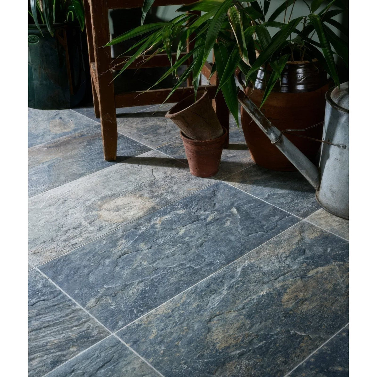 Lombok porcelain moss dark gray stone-effect floor tiles with natural textured veining and subtle lighter patches