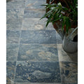 Dark gray lombok porcelain moss floor tiles with stone effect natural marble veining and subtle earthy undertones