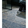Dark gray lombok porcelain moss floor tiles with natural marble-like veining and a matte stone-effect finish