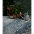 Dark blue and gray stone effect porcelain floor tiles with natural marbled texture from lombok porcelain moss collection