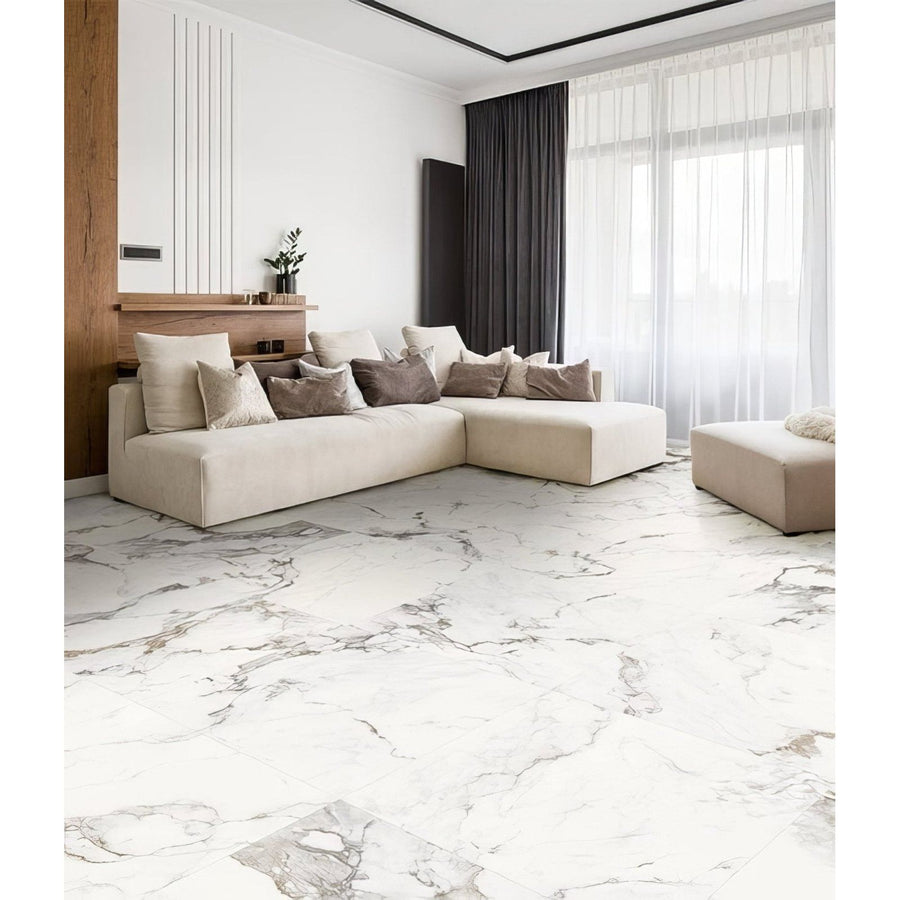Muscat Porcelain 60 x 120cm white marble-effect tiles with a beige sectional sofa