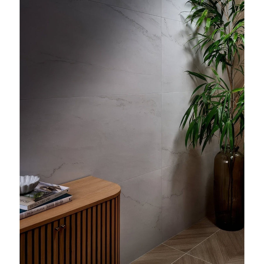 Light gray marble-effect porcelain matt wall tiles with subtle veining in 59.5 x 120cm size Mystery White