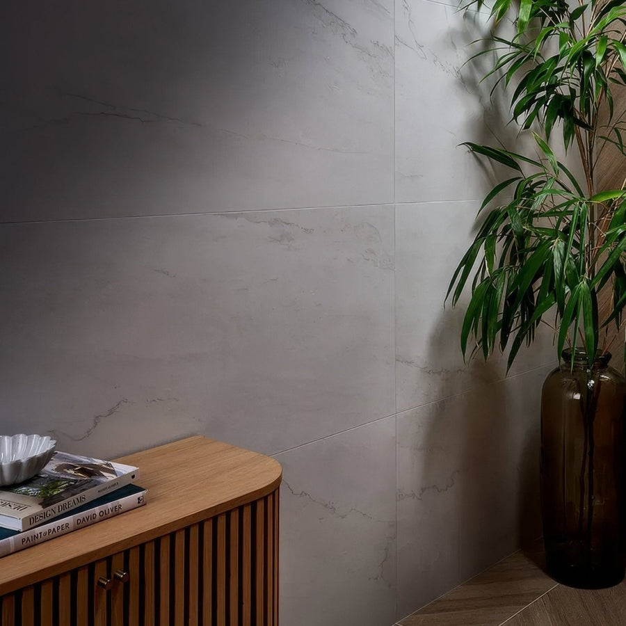 Light gray marble-effect Mystery White porcelain matt wall tiles with subtle veining 59.5 x 59.5cm